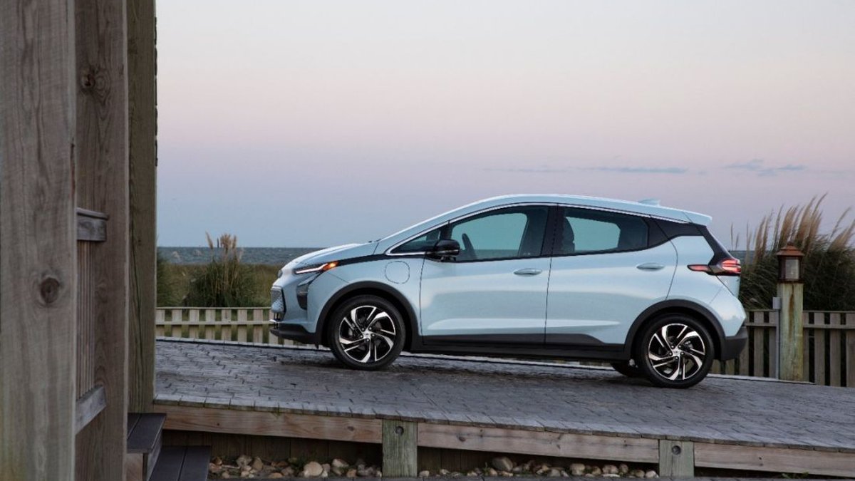 White Chevy Bolt on a Road