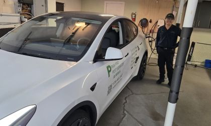 Image shows pest control owner with his 2025 Tesla Model Y Performance work vehicle