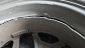 Image of a badly damaged Ford Bronco Sport Badlands wheel and tire